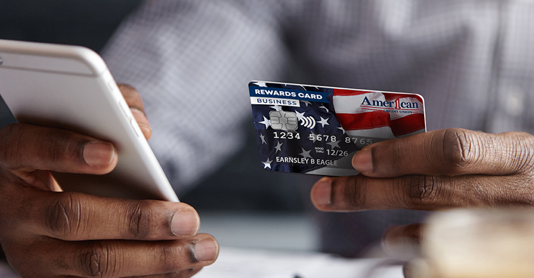 Man Holding Business Card