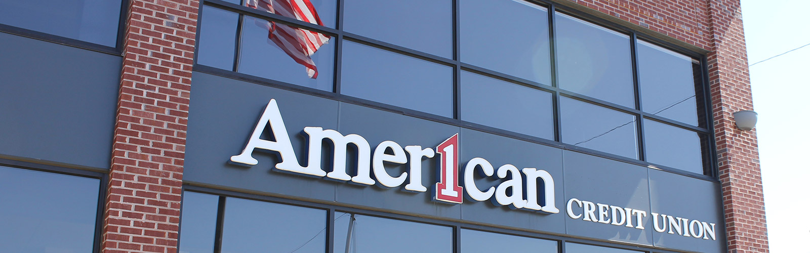 American 1 logo on building